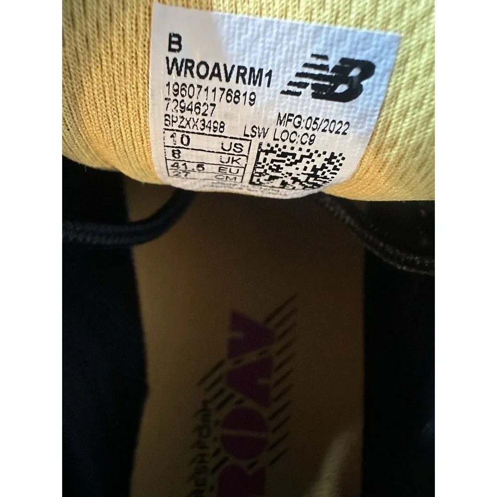 New Balance Black Athletic Sneakers with Pink and Yellow Accents